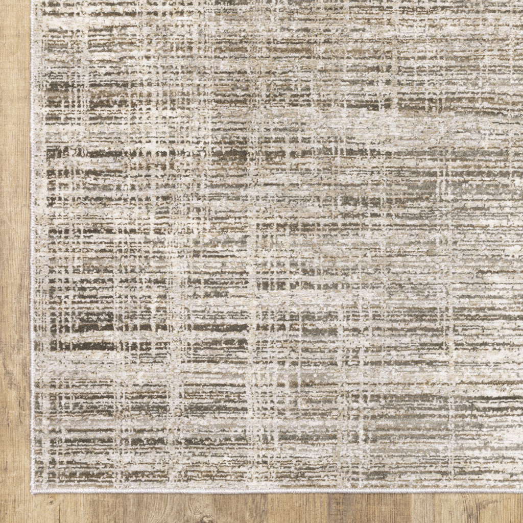 2' X 8' Beige Grey Ivory Tan And Brown Abstract Power Loom Stain